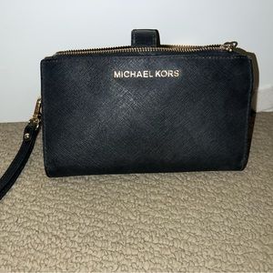 Authentic Michael Kors black leather wristlet